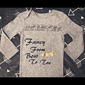Fancy from bow to toe onesie